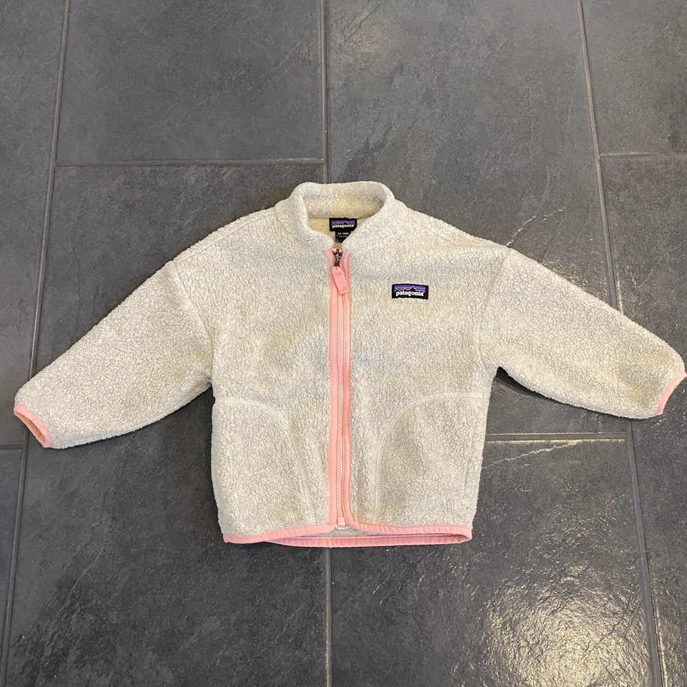 12-18 months girls Patagonia Cream Fleece Jacket with Pink Trim.